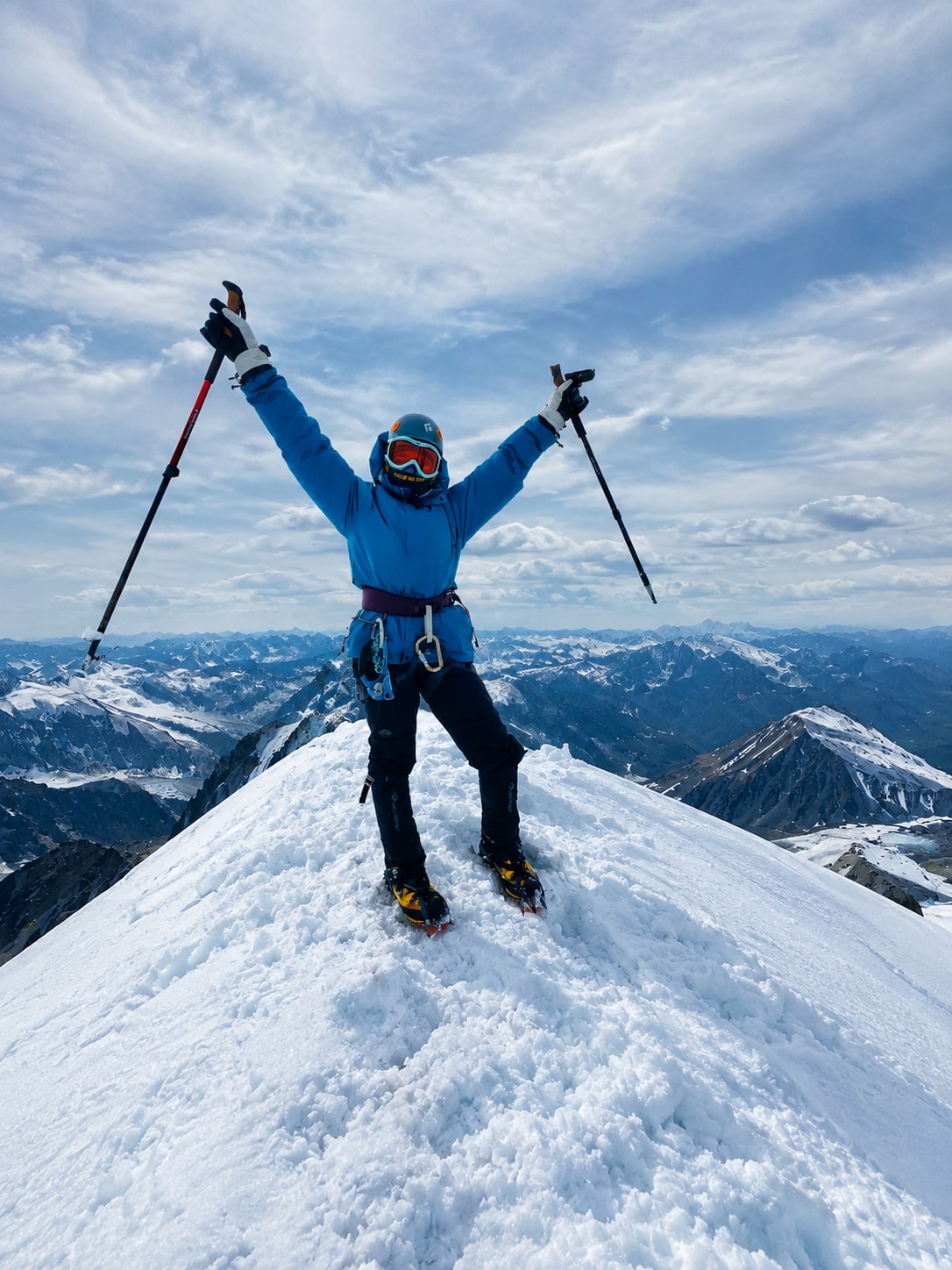 Oyuka Johnson on the summit of Khuiten Peak in the Altai mountains